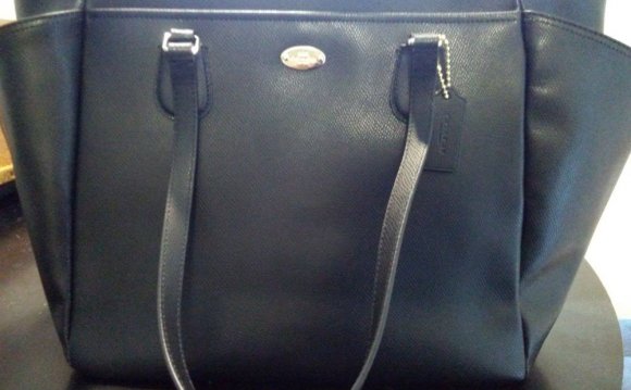 Black leather coach diaper bag